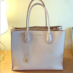 Michael Kors is leather purse